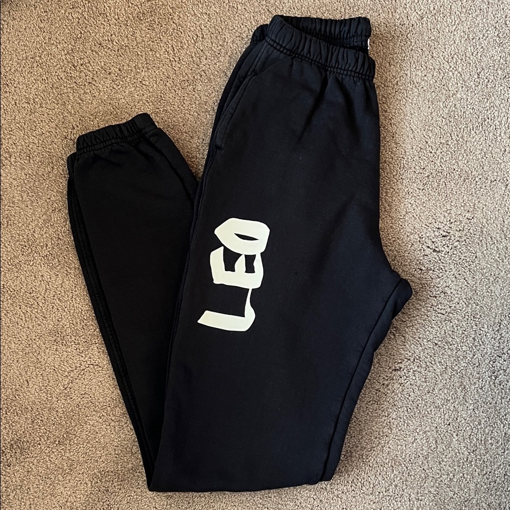 Good American Black Joggers with White 'LEO' Graphic, size 1 (small)